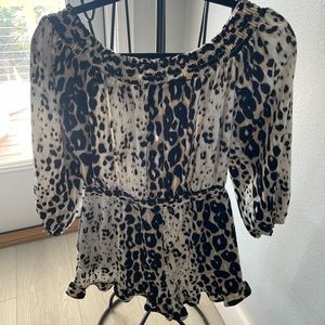 Bebe romper leopard print. Super cute wore one time.